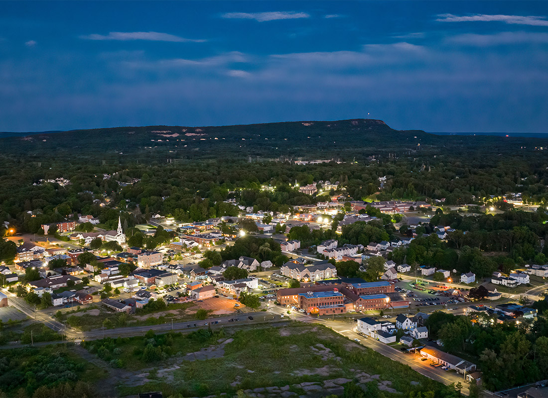 Contact - Aerial View of Downtown Southington, Connecticut at Night